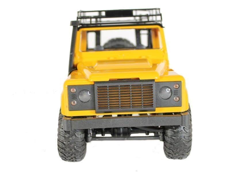 картинка Радиоуправляемый внедорожник Land Rover Defender 4WD 1:12 - MN-90-YELLOW 
